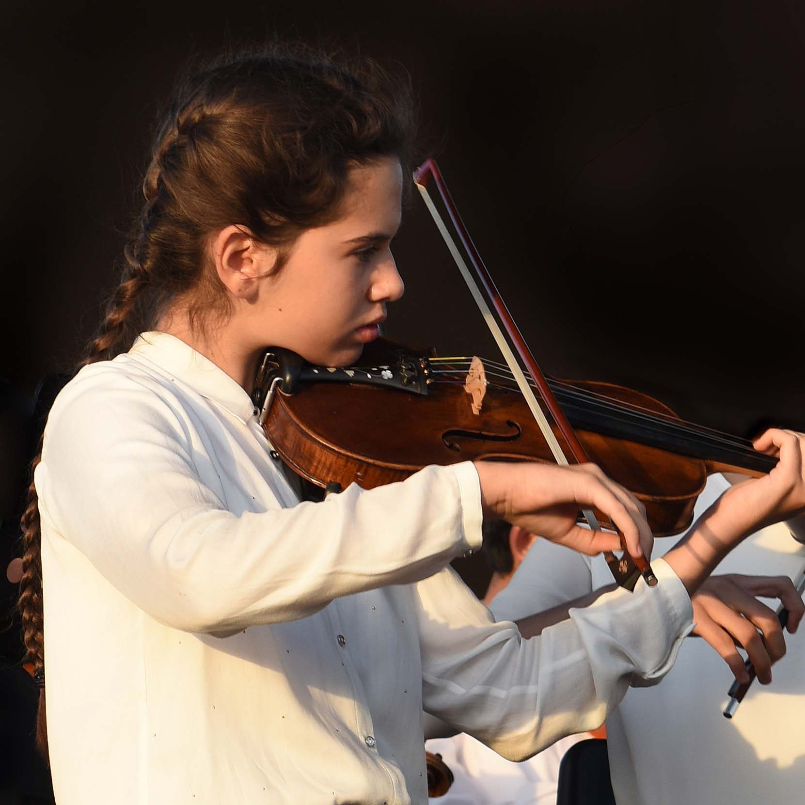 Salvaggio playing her violin